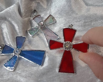 Small pendant crosses in stained glass decorated with a small silver cabochon