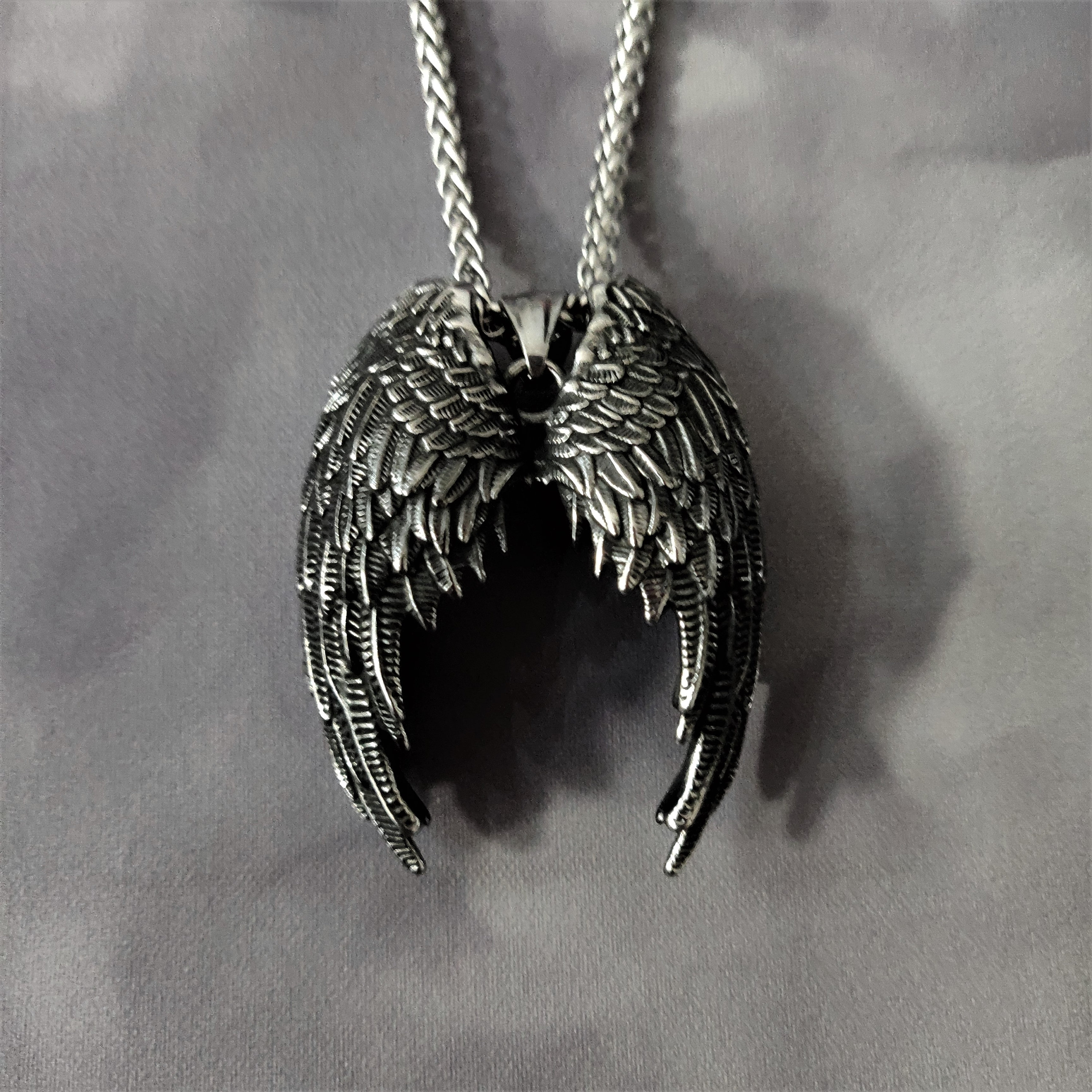 Angels and demons best sale jewelry