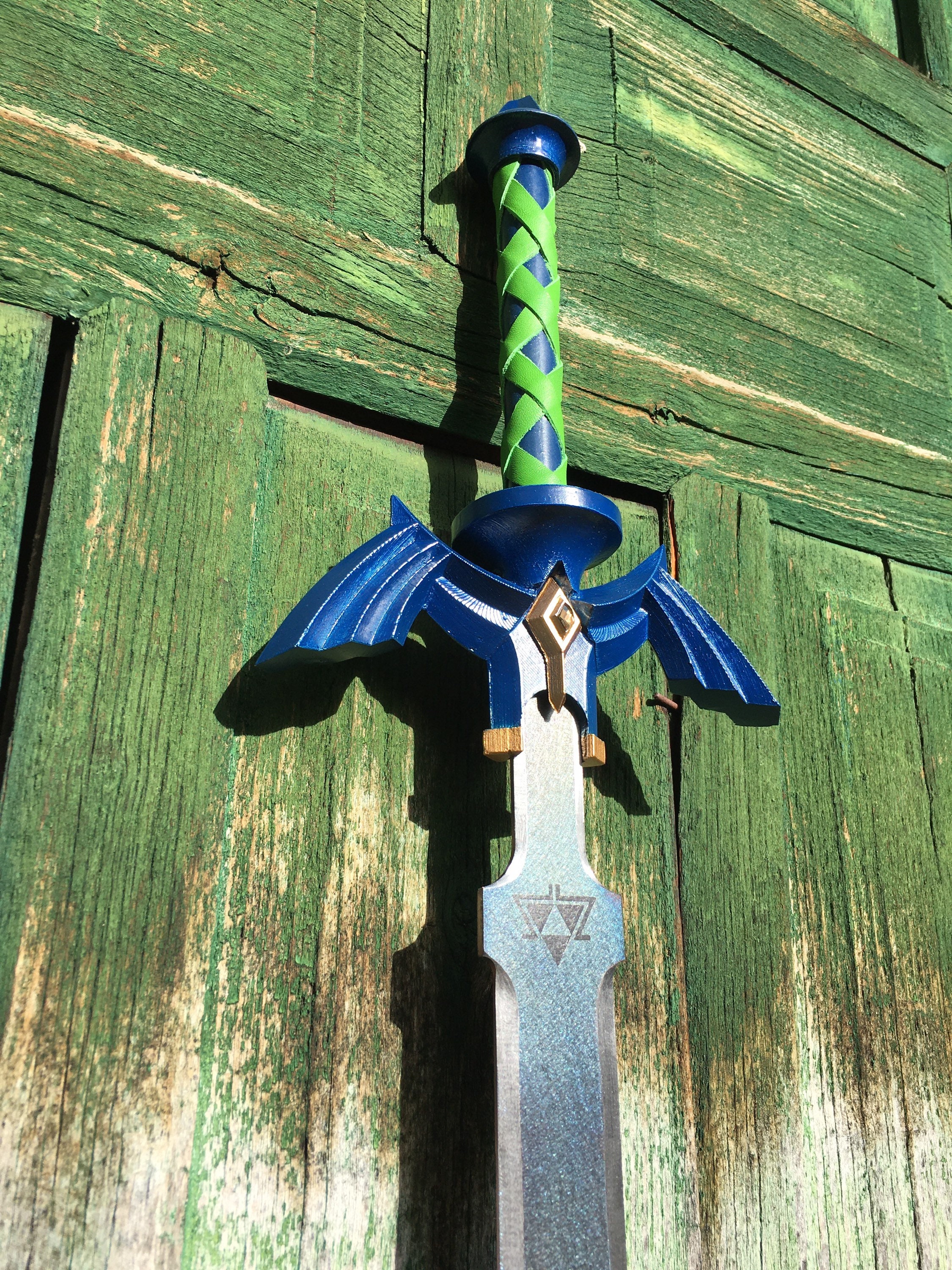 3D Printed & Hand-painted Legend of Zelda Master Sword in Stone