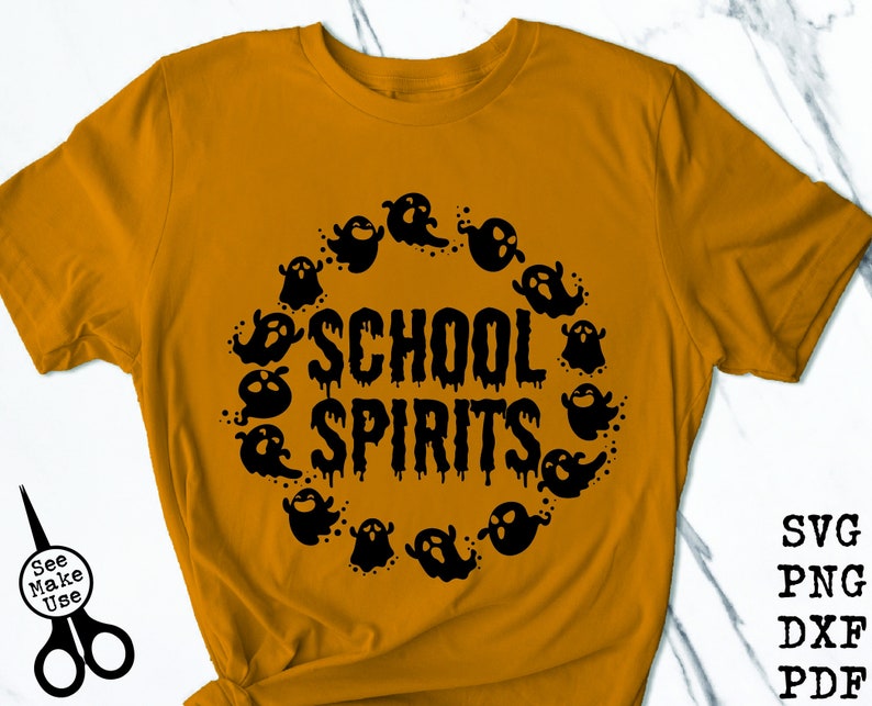 May include: A mustard yellow t-shirt with a black graphic of ghosts surrounding the text "SCHOOL SPIRITS".