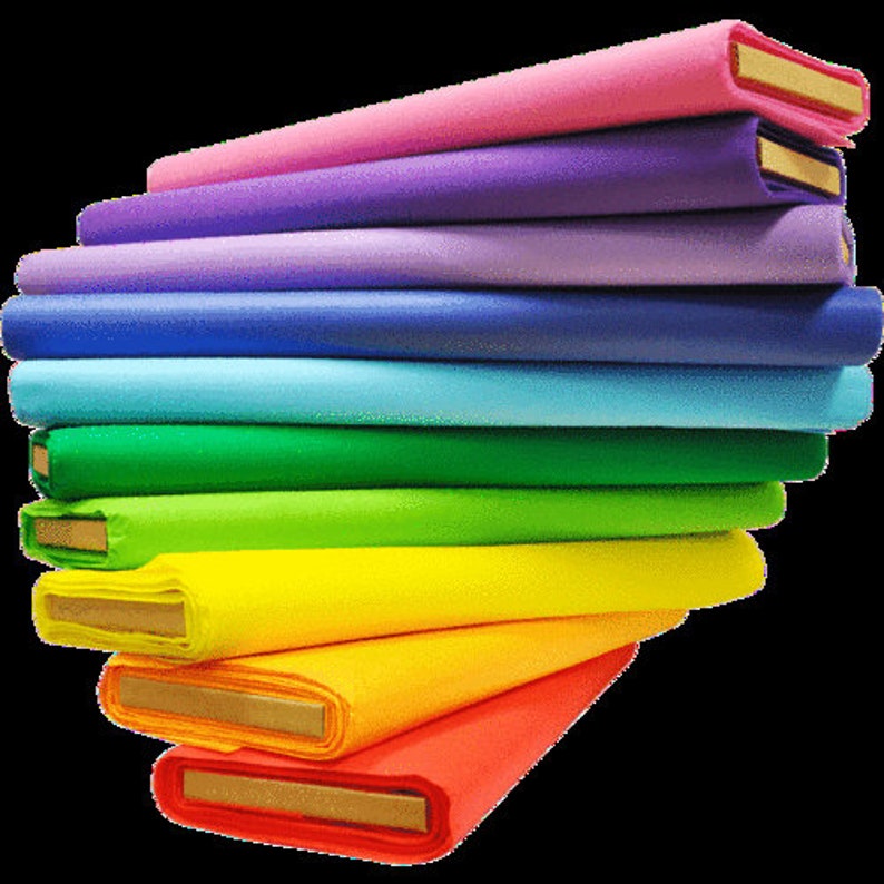 May include: A stack of colorful fabric rolls in various shades of pink, purple, blue, green, yellow, orange, and red. The fabric rolls are arranged in a rainbow pattern.