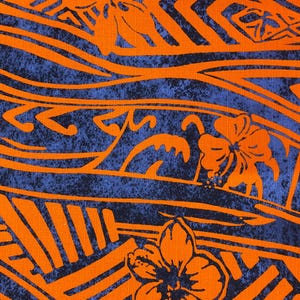 May include: Orange and blue patterned fabric with a floral design. The fabric has a textured, woven look.