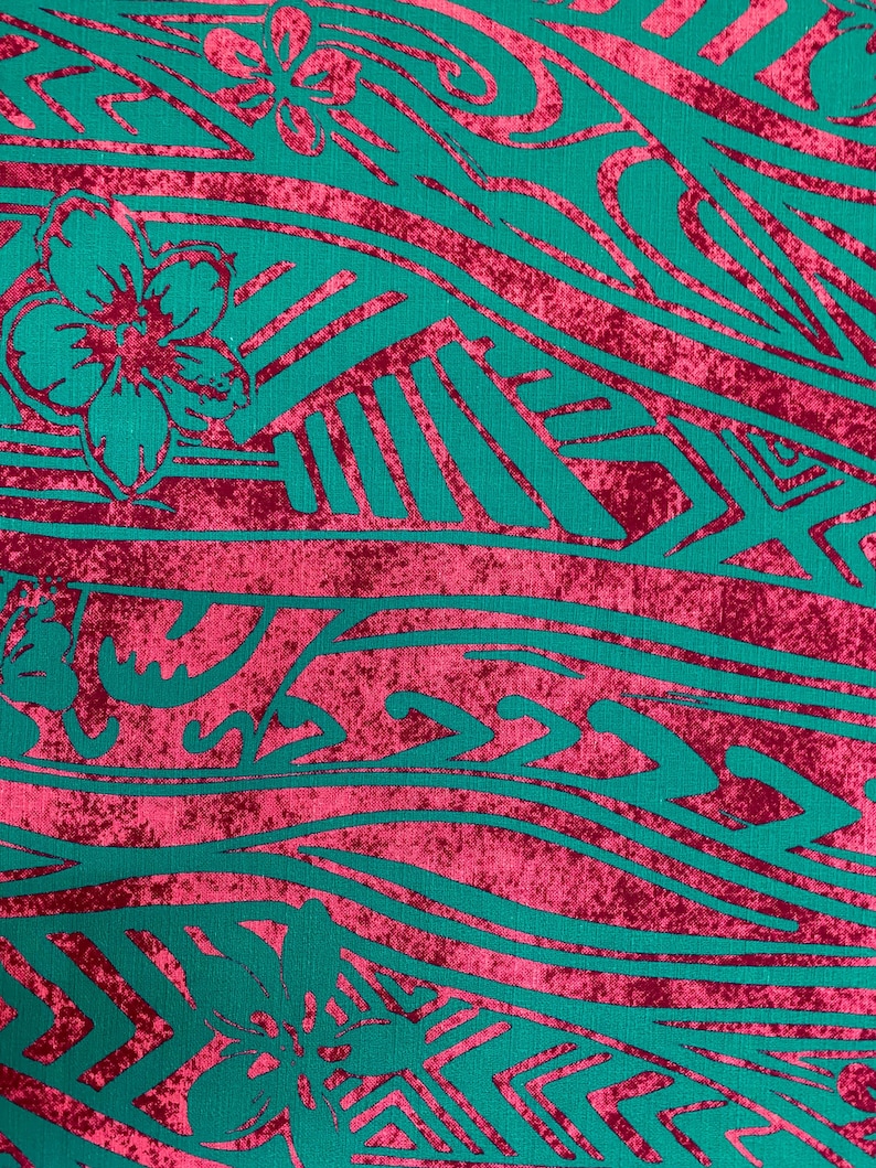 May include: Teal and pink fabric with a repeating pattern of stylized flowers and waves. The fabric has a textured, slightly distressed look.