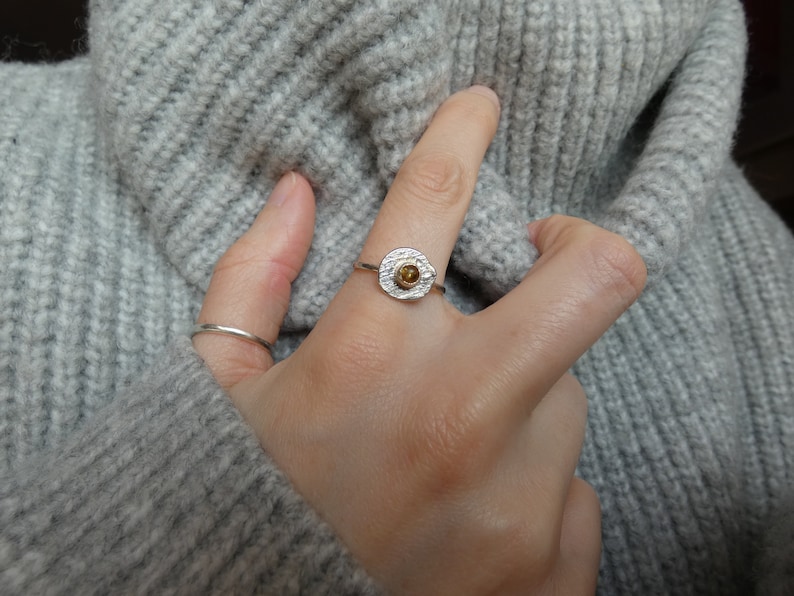 Silver ring set with amber