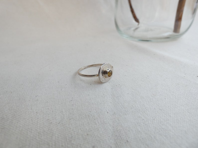 Silver ring set with amber