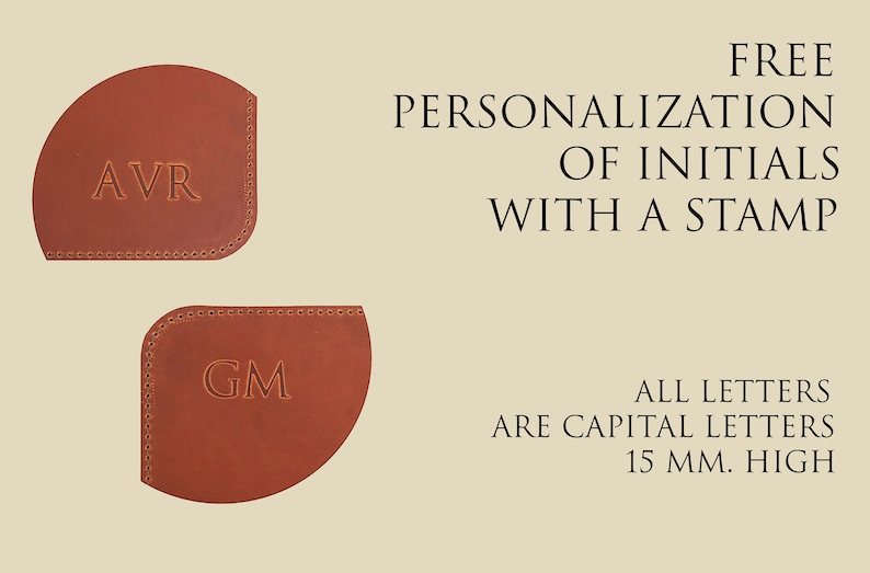 May include: Two brown leather corner bookmarks with initials "AVR" and "GM" embossed in gold. The bookmarks are 15 mm high. Free personalization of initials with a stamp.