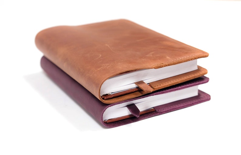 Leather notebook cover handcrafted to the size of  your notebook which you can personalize with engraving of any image and your name