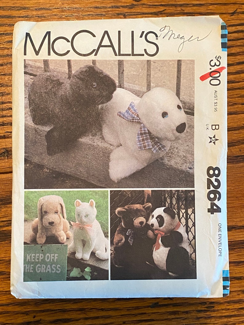 Uncut and factory fold. McCalls 8264 stuffed dog bear cat and seal pattern