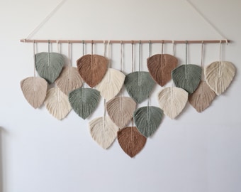 Boho-Inspired Macrame Wall Hanging: Handcrafted with Vibrant Colors and Textures for a Statement Piece in Your Home Decor