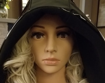 Slick Black Vinyl. This Updated Rain Hood is not only pretty, it's Waterproof, Warm & Cozy. Fleece Interior. See Description.