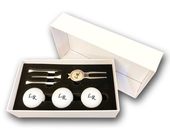 Golf ball set personalized with engraving of initials 3 Wilson golf balls, divot repair tool and 3 tees in a white gift box