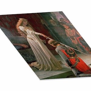 May include: A woman in a white gown and crown holds a sword over a kneeling man in armour. The man is wearing a red and gold tunic with a black eagle on the chest. The woman is surrounded by other people in the background.