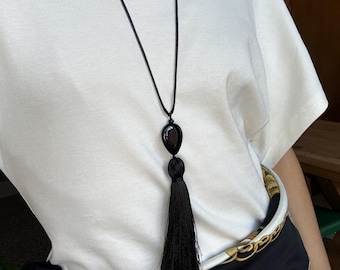Tassel pendant with black gem stone