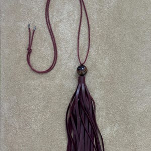 Necklace with cord and leather tassel: maroon / burgundy / Moss