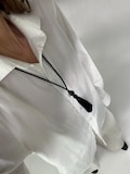 necklace with gemstone and tassel product logo