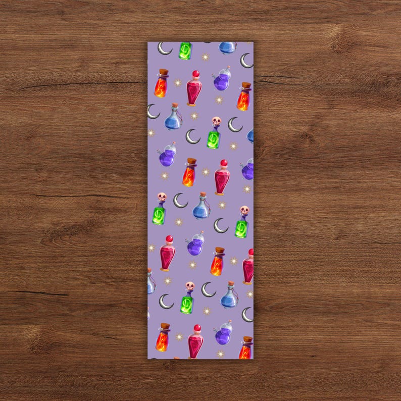 May include: A purple bookmark with a repeating pattern of colorful potion bottles, moons, and stars. The bottles are various colors, including red, green, blue, and purple, with cork stoppers. A whimsical design.