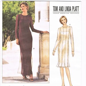 May include: A sewing pattern for two long dresses. The pattern is from Vogue Patterns and designed by Tom and Linda Platt. The pattern number is 2715.