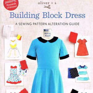 Può includere: Un libro intitolato "Building Block Dress: A Sewing Pattern Alteration Guide" di Liesl Gibson. La copertina presenta un abito blu con colletto bianco e bordatura nera, insieme a campioni di tessuto e schizzi di diversi stili di abiti.