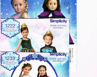 Lote de 3 disfraces y ropa de Frozen de Disney sin cortar. Disfraz de Elsa y Anna, capa, vestido y abrigo para muñeca American Girl de 45 cm. Simplicity 1222 y 1233.
