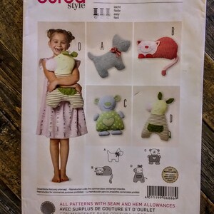 May include: Burda Style sewing pattern number 6886 for making stuffed animal cushions. The pattern includes instructions for making a dog, cat, bear, and pig. The pattern is easy to follow and includes seam and hem allowances.