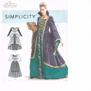 Puede incluir: Un patrón de costura Simplicity para un disfraz, con una mujer que lleva un vestido morado y verde con detalles dorados. El número del patrón es S9166 y la talla es H5, tallas de EE. UU. 6-14, tallas de Europa 32-40 y tallas francesas 34-42.