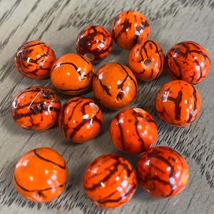 Bombona Ball Beads. 30 Orange Patterned Pieces.