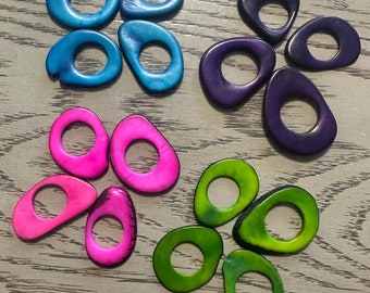 Tagua Nut Hoops - Donuts - Rings. 16 Discs of Tagua in 4 Colors. Tagua Rings. Size: 4x3.5 cm. approx. Drilled or Undrilled. Jewelry Making