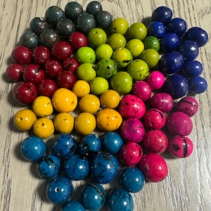 Multicolor set bombona beads. Big size: 2 - 2.5 cm. 70 beads in seven colors. Top drilled. Colombian seeds. Natural Jewelry Making Supplies