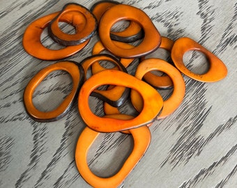 Tagua Beads. Orange Tagua Hoops - Donuts - Rings. 20 Pieces of Tagua from Colombia. 4 x 3.5 cm. approx. Drilled or Undrilled. Free Shipping