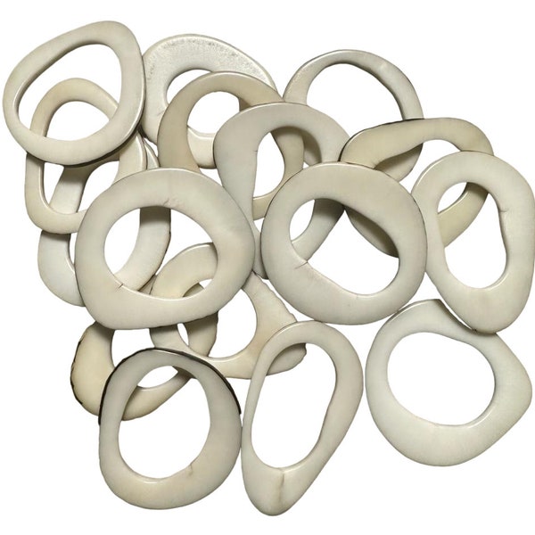 Tagua beads Large. Tagua discs natural beige ivory color. 20 tagua rings from Colombia. Large Size: 2 x 1.5 inches. Drilled or Undrilled