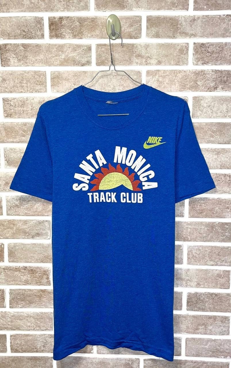 cerveza negra población traductor Rara camiseta vintage Nike Santa Monica Track Club - Etsy España