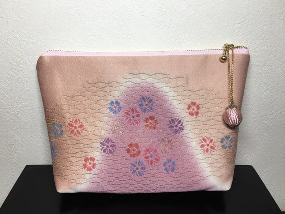 pink and gold purse