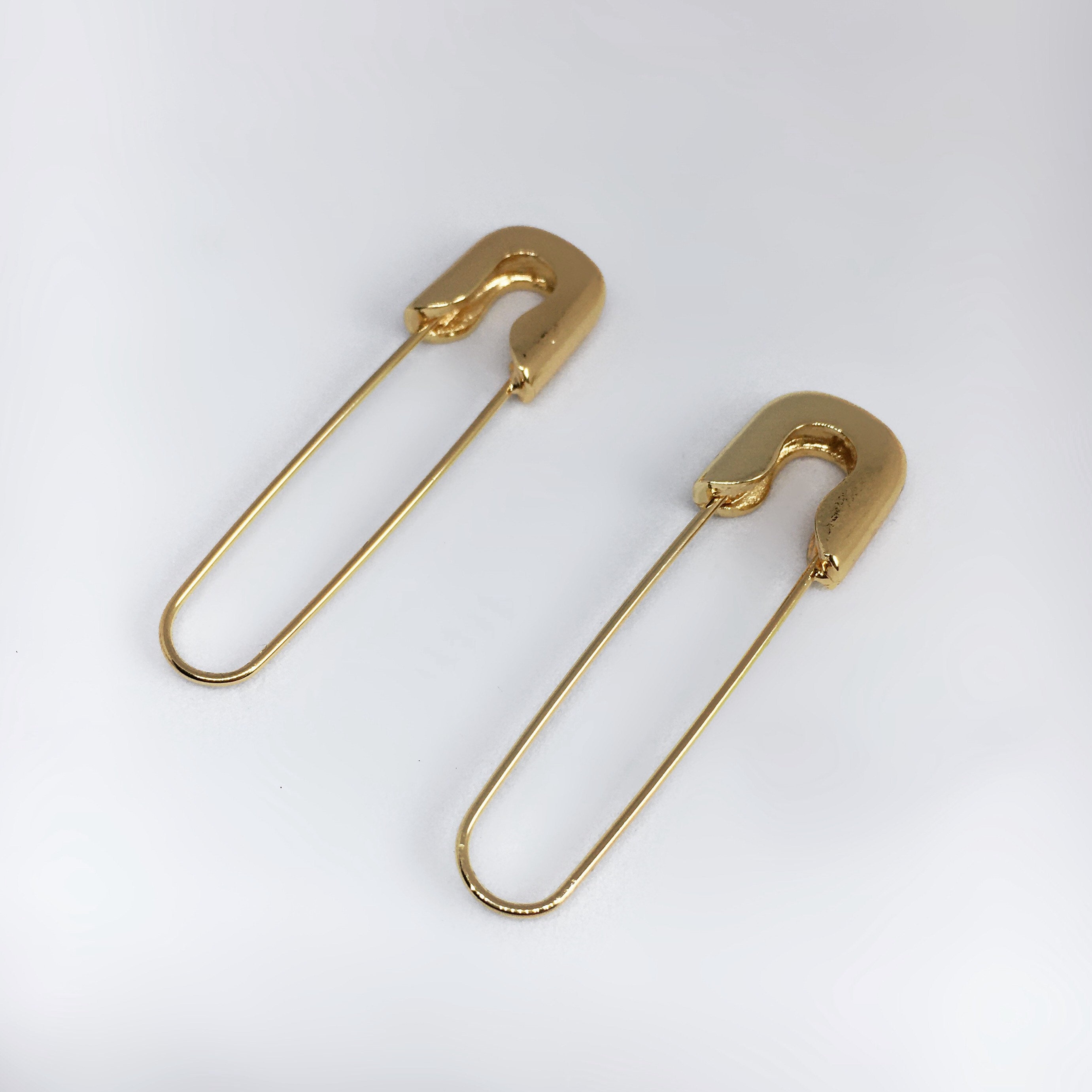 safety pin earrings expensive