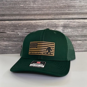 Bigfoot Forest Flag Leather Patch Hat - American Flag Design with Breathable Mesh