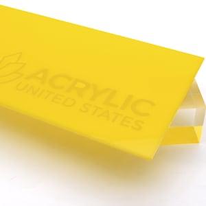 May include: A bright yellow sheet of acrylic plastic with the text "ACRYLIC UNITED STATES" printed on it.