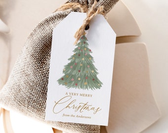 May include: A gift tag with a watercolor Christmas tree design. The tag reads "A Very Merry Christmas" with a personalized name. The tag is attached to a burlap gift bag with twine.