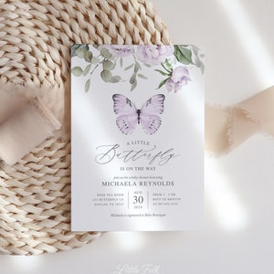 May include: A baby shower invitation with a purple butterfly illustration and floral accents. The invitation reads "A Little Butterfly is on the Way" and includes the name Michaela Reynolds, the date August 30, 2024, and the location Rose Tea Room.