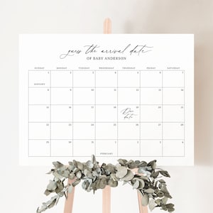 Könnte beinhalten: Ein weißer Kalender mit schwarzem Text und Linien. Der Kalender ist für Januar und Februar. Der Text "Erraten Sie das Ankunftsdatum von Baby Anderson" steht oben auf dem Kalender. Das Fälligkeitstermin ist im Kalender mit dem Text "Fälligkeitstermin" markiert.