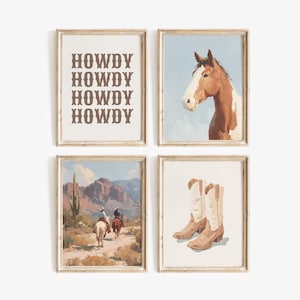 May include: Set of four framed art prints with a Western theme. Includes a print with the word "HOWDY", a horse portrait, a desert landscape with riders, and a pair of cowboy boots. The frames are a light brown color.