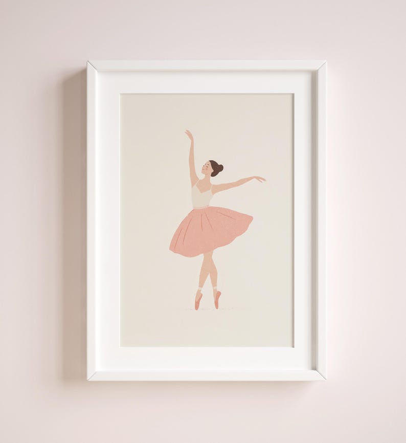 May include: A framed art print featuring a minimalist illustration of a ballerina. The dancer is depicted in a graceful pose, wearing a white leotard and a pink tutu. The artwork is set against a neutral background, framed in a white border.