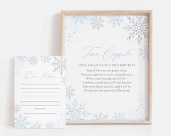May include: A framed print and a card with snowflake designs. The print reads "Time Capsule" and includes text about opening on a birthday. The card says "Dear Jackson" and has lines for writing.