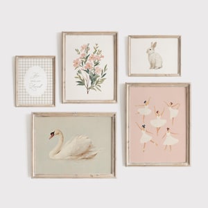 May include: A collection of framed art prints featuring a swan, a bunny, ballet dancers, and floral arrangements. The prints have a neutral color palette with soft pink and green accents, and are displayed against a white background.