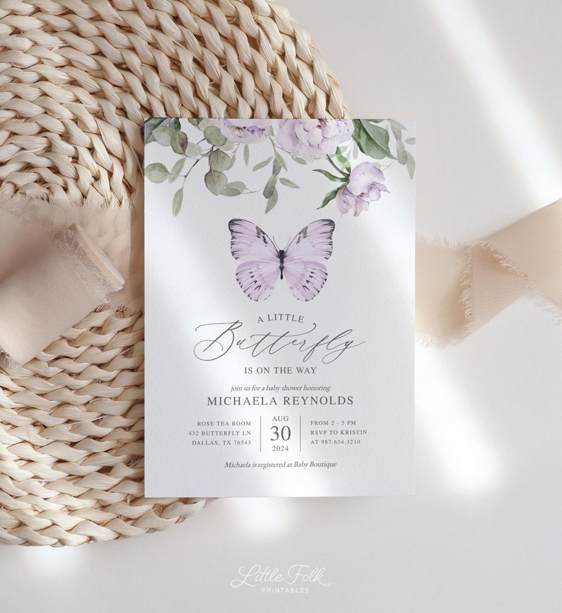 May include: A baby shower invitation with a purple butterfly illustration and floral accents. The invitation reads "A Little Butterfly is on the Way" and includes the name Michaela Reynolds, the date August 30, 2024, and the location Rose Tea Room.