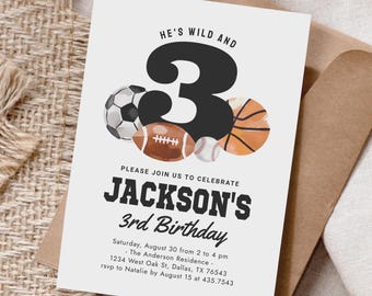 May include: A white birthday invitation with the text "HE'S WILD AND 3" and "JACKSON'S 3rd Birthday". The invitation features illustrations of a soccer ball, football, baseball, and basketball. The invitation is on a brown envelope.