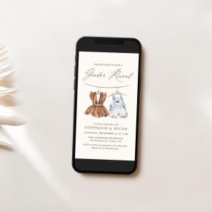 May include: A smartphone screen displaying a gender reveal party invitation. The invitation features a watercolor illustration of two baby outfits hanging on a clothesline. The text reads "Please join us for a Gender Reveal" and includes the names Stephanie and Micah, the date and time of the event, and the location.