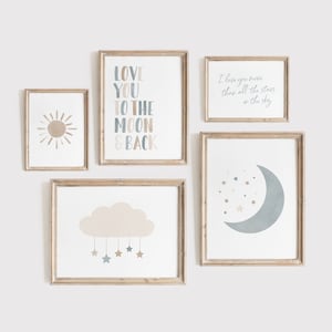 May include: Five framed prints with a nursery theme. The prints feature a sun, a moon, a cloud with stars, and two text prints. One print says "Love you to the moon & back" and the other says "I love you more than all the stars in the sky."