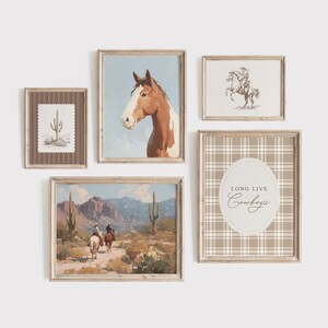 May include: A collection of framed art prints with a Western theme. The prints feature images of a horse, cowboys on horseback, a desert landscape, and a cactus. One print has the text "Long Live Cowboys". The frames are light brown.