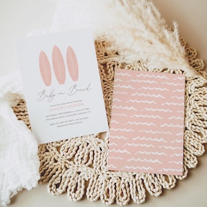 May include: A pink baby shower invitation with the text "Baby on Board" and three pink surfboards. The invitation includes the date, time, and location of the shower.