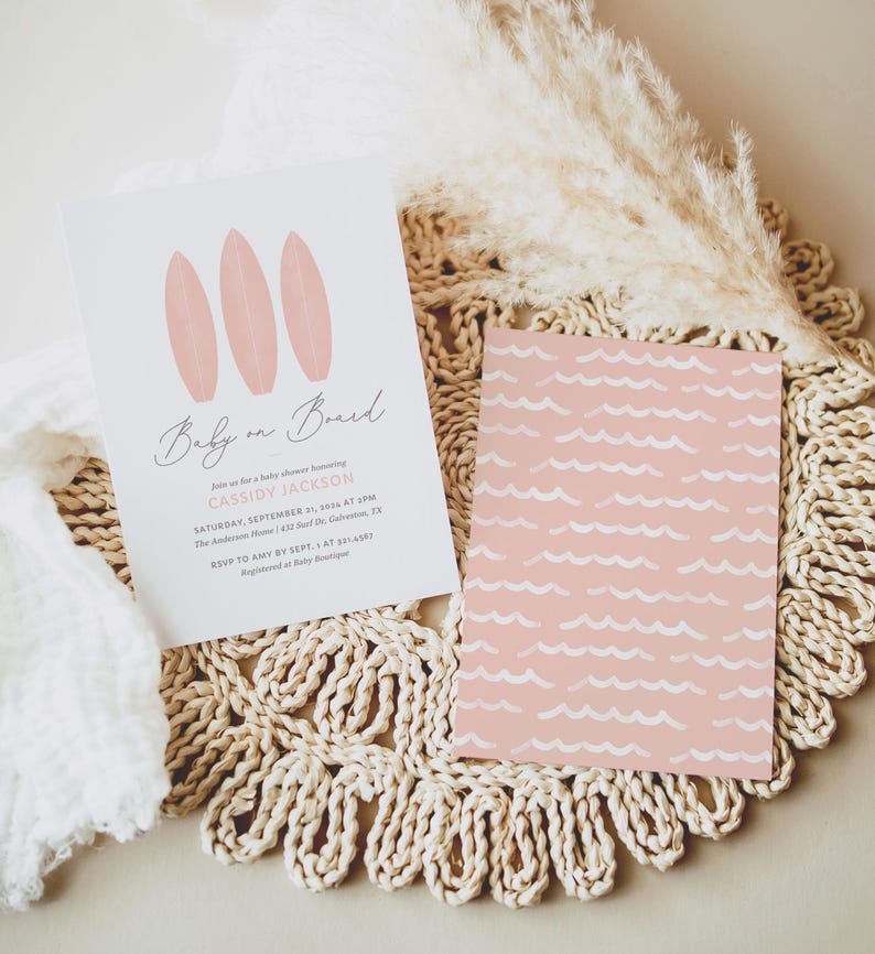 May include: A pink baby shower invitation with the text "Baby on Board" and three pink surfboards. The invitation includes the date, time, and location of the shower.