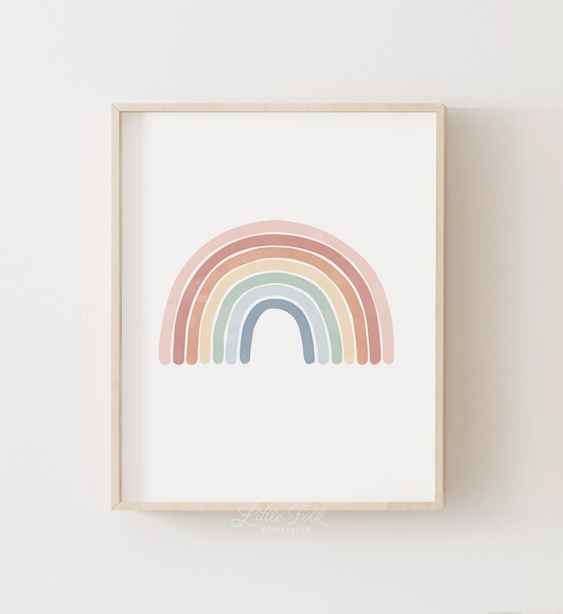 K&ouml;nnte beinhalten: Ein druckbarer Kunstdruck mit einem Regenbogen in Pastellfarben und dem Text "Little Folk Printables" unten.